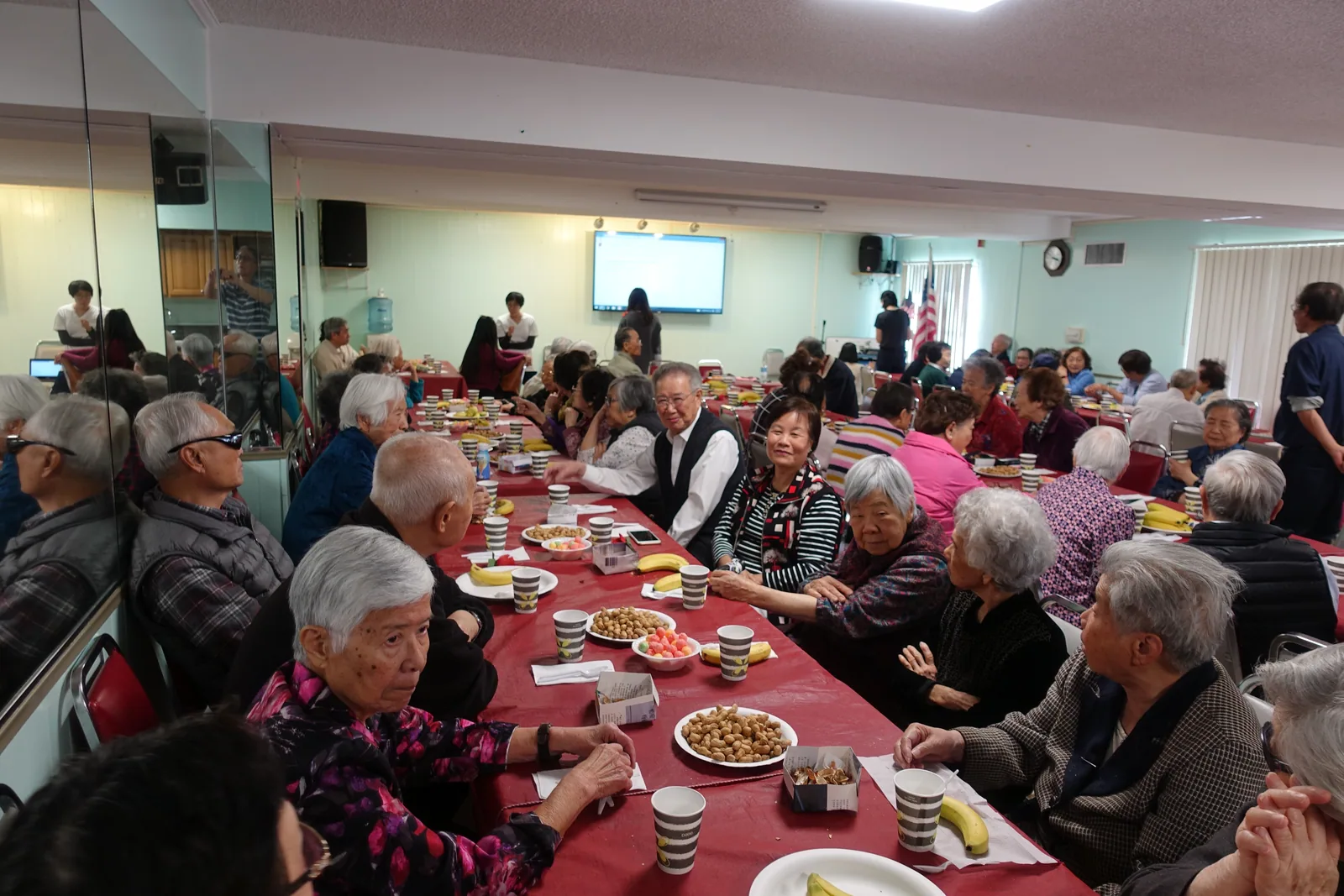Residents at a Golden Age Village monthly birthday party