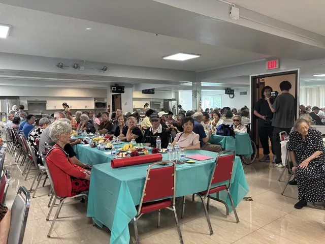 Residents gathered in the activity hall for the September birthday party