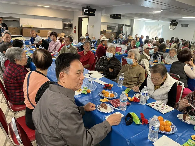 A full house of residents enjoying the birthday party