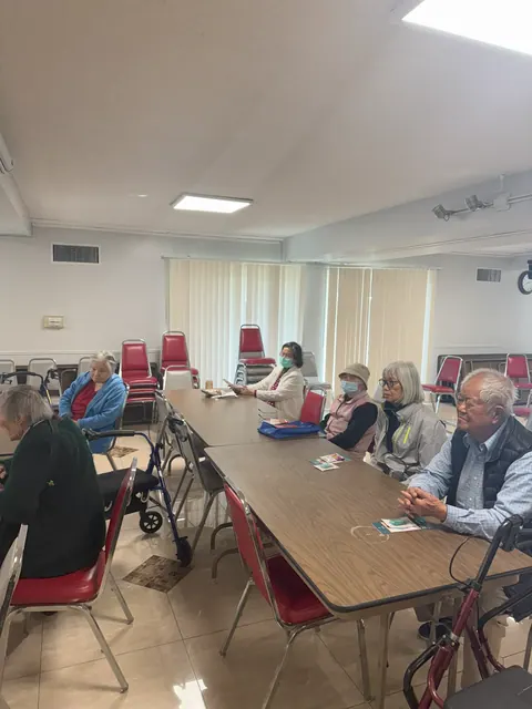 Residents listening attentively at the fall prevention seminar